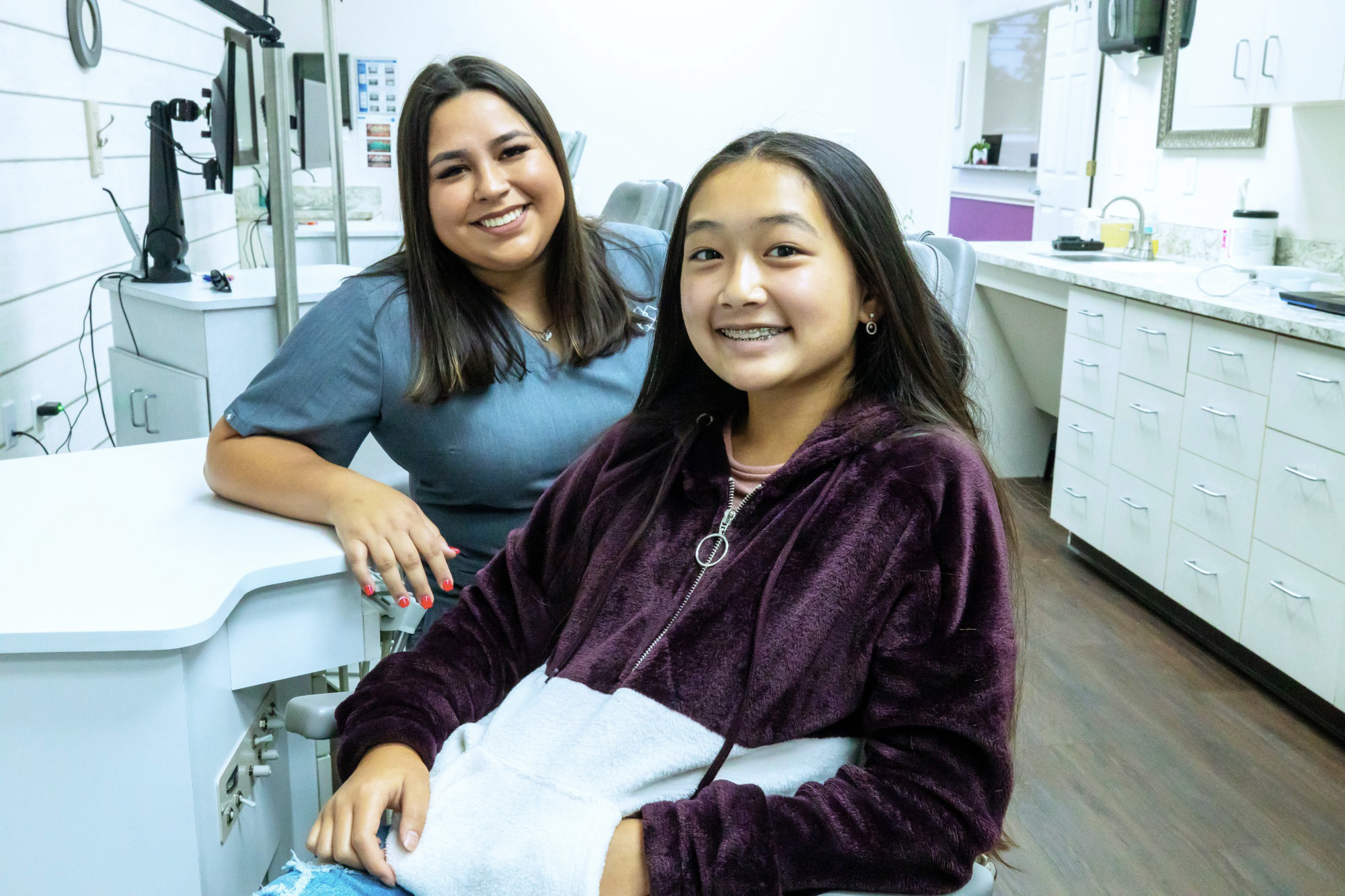 dr. vo and patient smiling