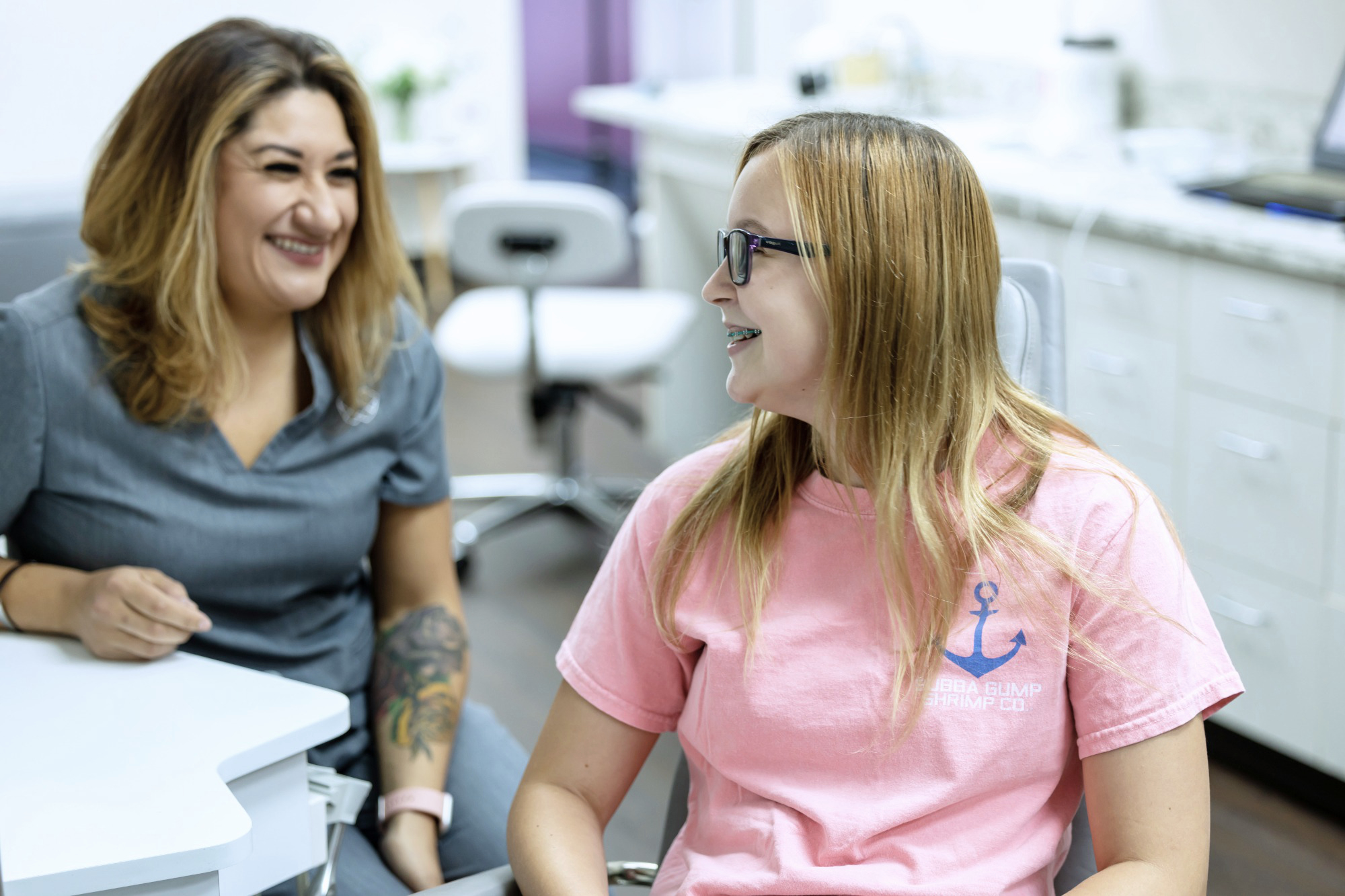 dr. vo and patient smiling